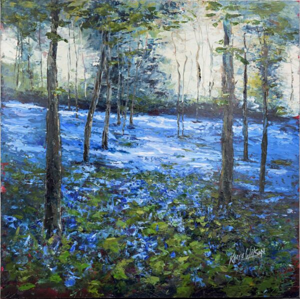 image of a print by Karen Wilson of bluebells in a wood. Mounted and framed, it measures 40cm x 40cm