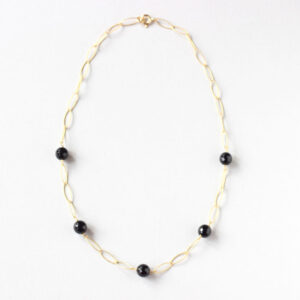 image of gold chain necklace with black onyx stone